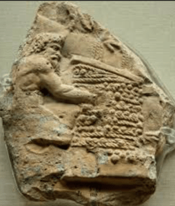 Satyr working at a wine press of wicker-work mats (1st century AD relief).